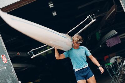 Man standing in boat