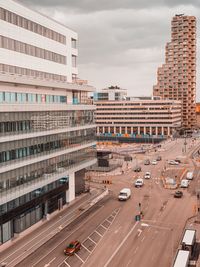 High angle view of buildings in city against sky