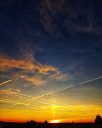 Low angle view of dramatic sky during sunset