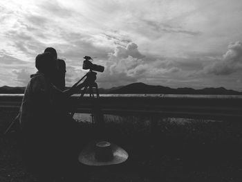 Man photographing landscape
