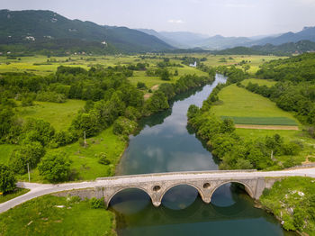 Aerial view of the old stone bridge on the lika river, croatia