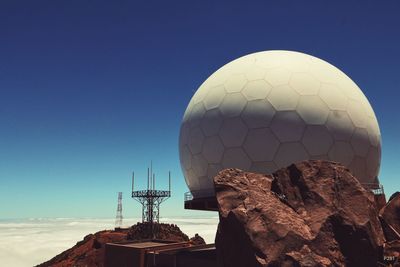 Low angle view of built structure against blue sky