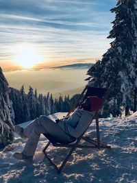 Scenic view of snow mountains against sky during sunset
