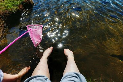 Low section of person in water