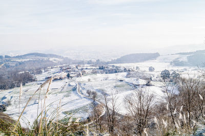 High angle view of cityscape against sky during winter