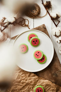 High angle view of fruits in plate on table