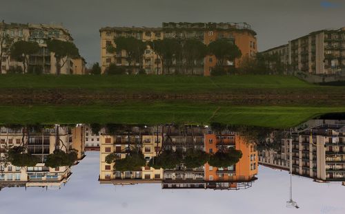 Buildings in city against sky