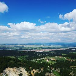 Scenic view of landscape against cloudy sky