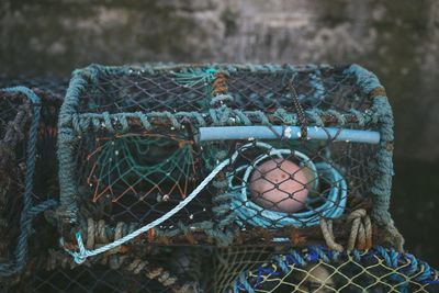 Close-up of fishing net in basket