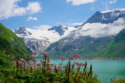 Scenic view of snowcapped mountains against sky