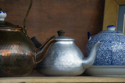 Close-up of tea in jar on table