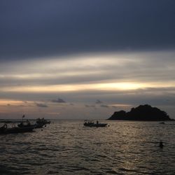 Scenic view of sea at sunset