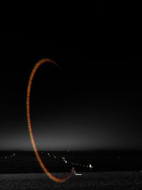 Scenic view of sea against sky at night