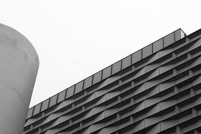 Low angle view of modern building against clear sky