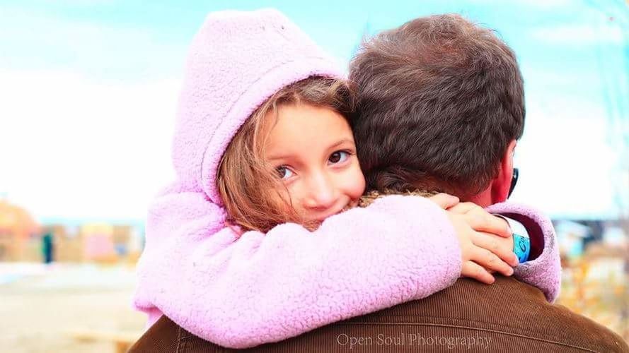 CUTE GIRL HOLDING BABY