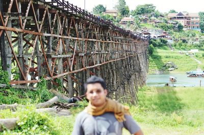 Portrait of senior man against built structure