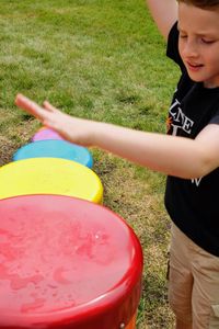 High angle view of boy playing on field