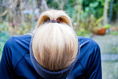 Close-up of young woman with blond hair