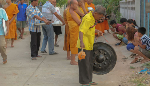 Low section of people standing on floor