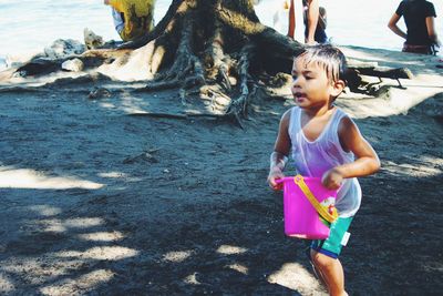 Full length of boy on beach