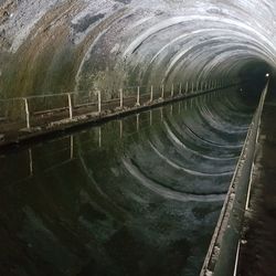 High angle view of railroad tracks in tunnel