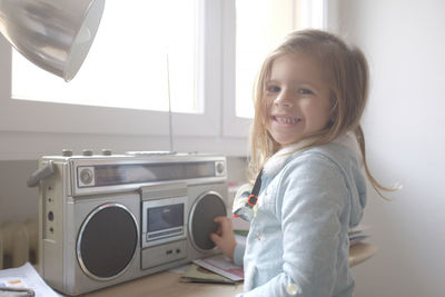 Portrait of smiling girl at home