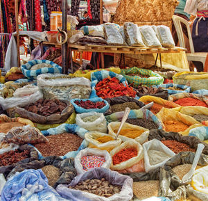 Various spices for sale at market stall