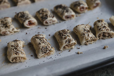 Meat rolls with sesame on tray