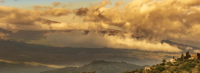 Panoramic view of mountains against sky