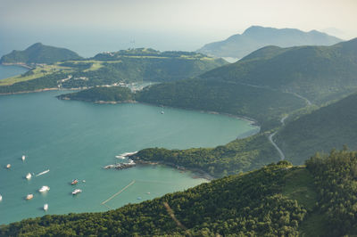 High angle view of river with mountain range in background