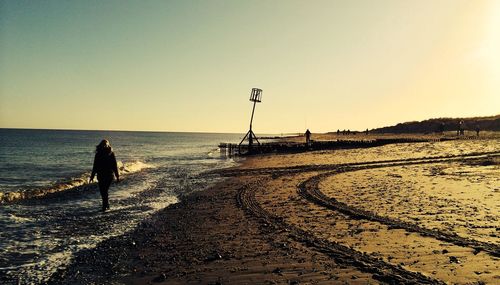 Scenic view of sea at sunset