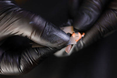 Close-up of woman holding hands