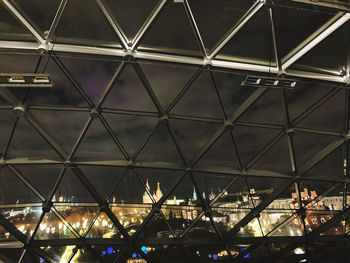 Low angle view of illuminated ceiling