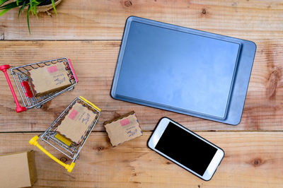 High angle view of smart phone on table