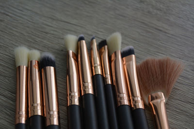 Close-up of paintbrushes on table