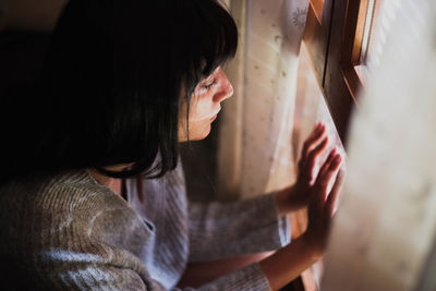 Portrait of woman looking at camera