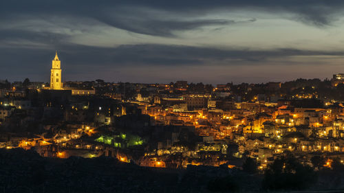 High angle view of illuminated buildings in city