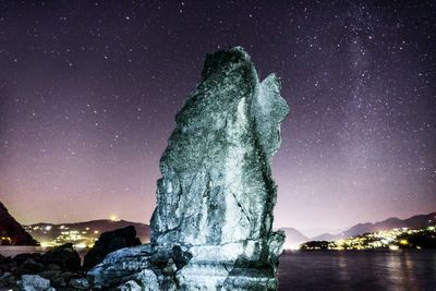 Panoramic view of sea against sky at night