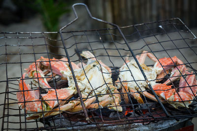 Close-up of meat on barbecue grill