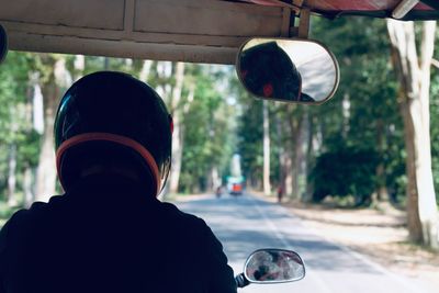 View to tuk-tuk driver