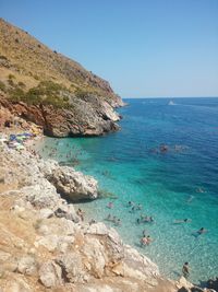 Scenic view of sea against clear blue sky