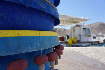 Close-up of fishing equipment hanging on boat