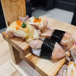 Close-up of sushi served on table