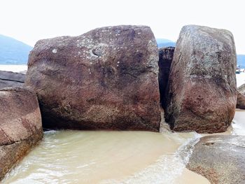 Close-up of rock in sea