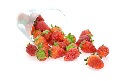 Close-up of strawberries against white background