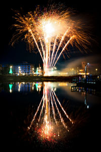 Fireworks in a city at night