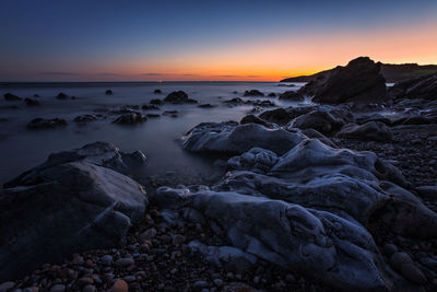 Scenic view of sea during sunset