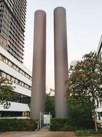 Low angle view of skyscrapers against clear sky