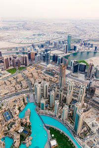 High angle view of river amidst buildings in city