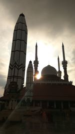 Low angle view of temple against sky during sunset